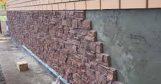 Профессиональная отделка фундамента панелями в Новотроицке в октябре